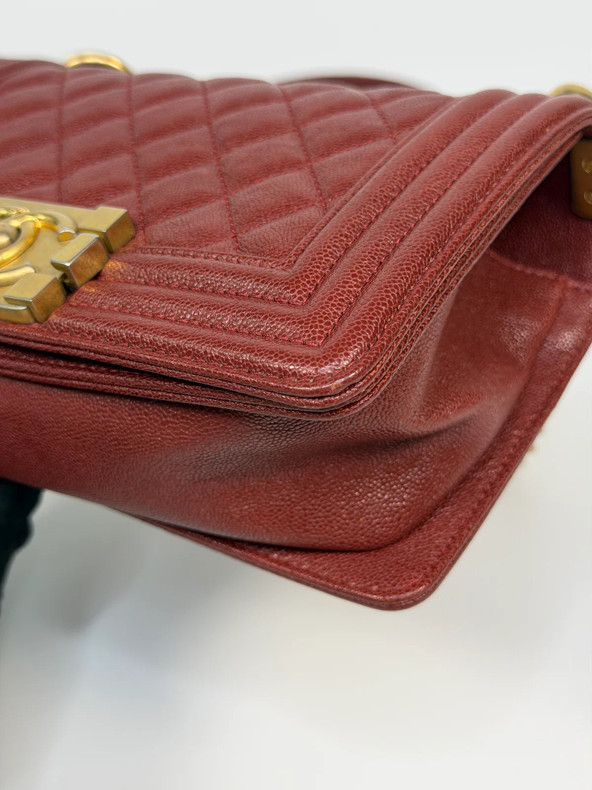 CHANEL SMALL LE BOY BAG IN BURGUNDY CAVIAR LEATHER WITH AGED GOLD HARDWARE