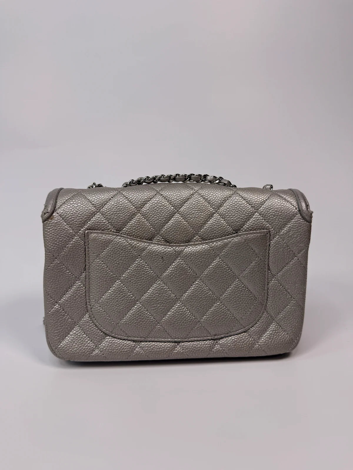 CHANEL CC FILIGREE WALLET ON CHAIN IN METALLIC SILVER