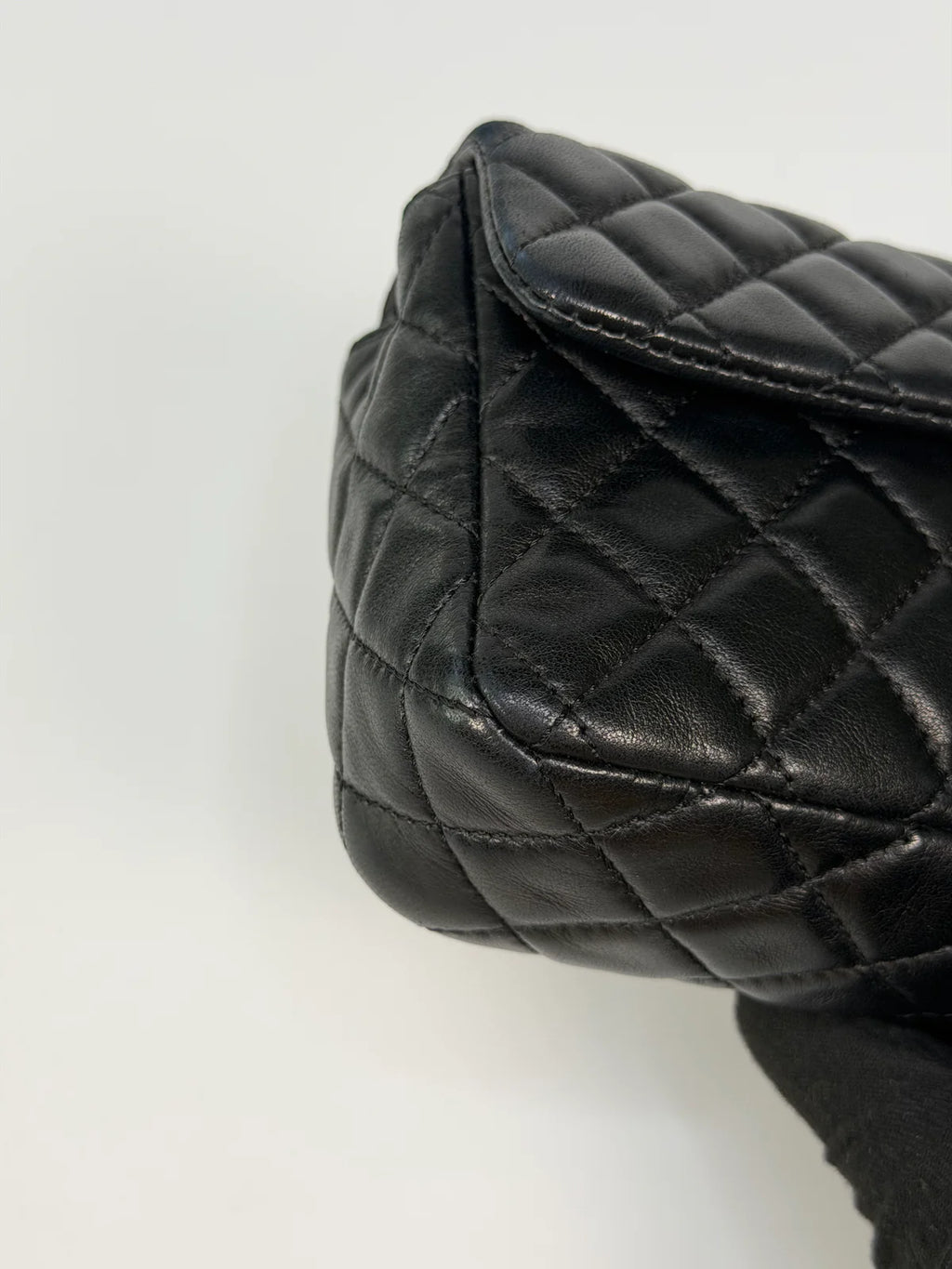 CHANEL EAST WEST CHARMS BAG IN BLACK LAMBSKIN LEATHER WITH GOLD HARDWARE