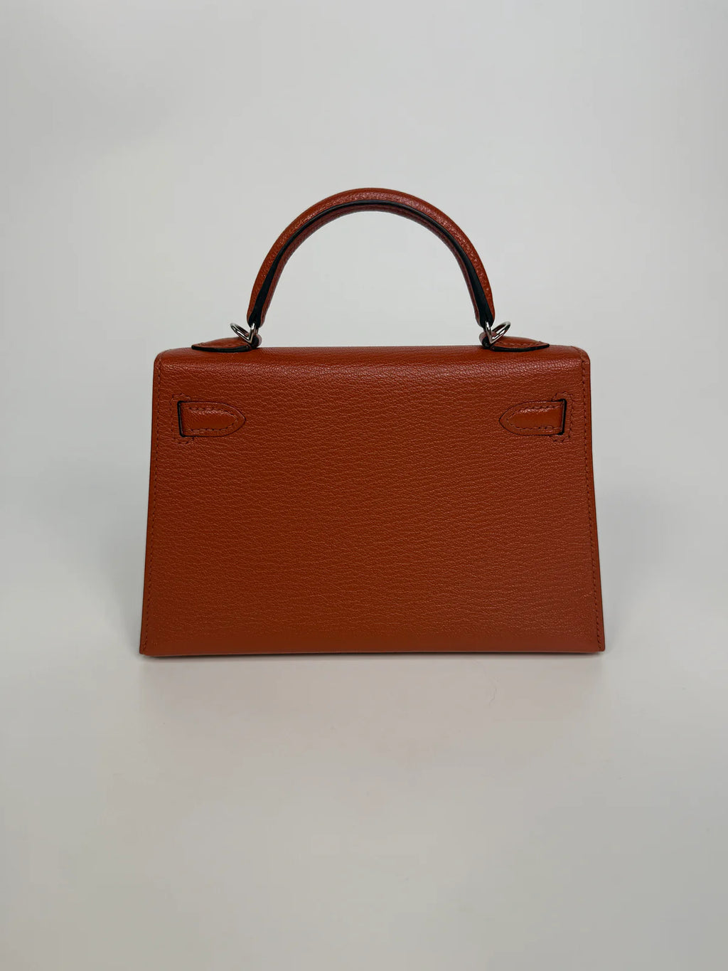 HERMÈS MINI KELLY IN CUIVRE CHÈVRE MYSORE LEATHER WITH PALLADIUM HARDWARE