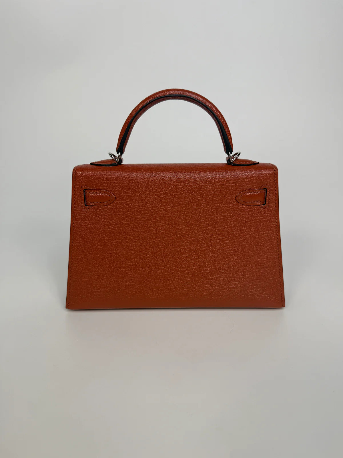HERMÈS MINI KELLY IN CUIVRE CHÈVRE MYSORE LEATHER WITH PALLADIUM HARDWARE