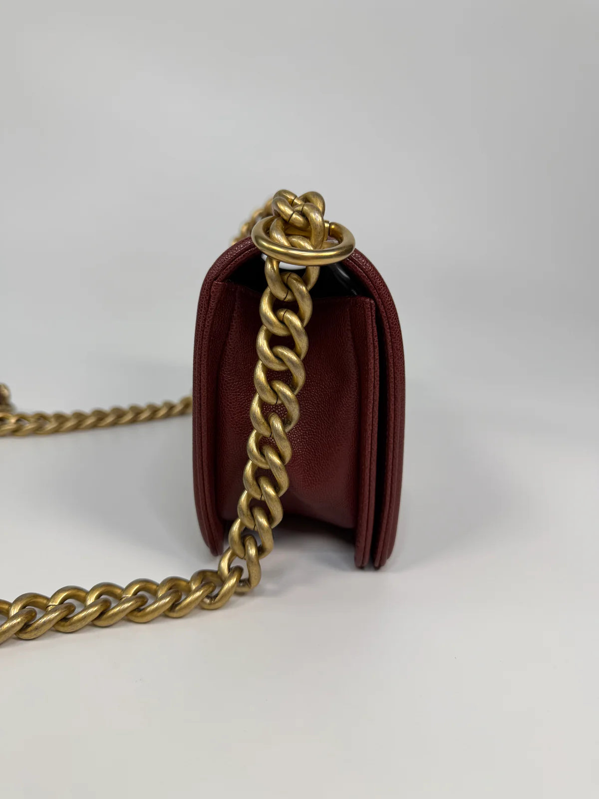 CHANEL SMALL LE BOY BAG IN BURGUNDY CAVIAR LEATHER WITH AGED GOLD HARDWARE