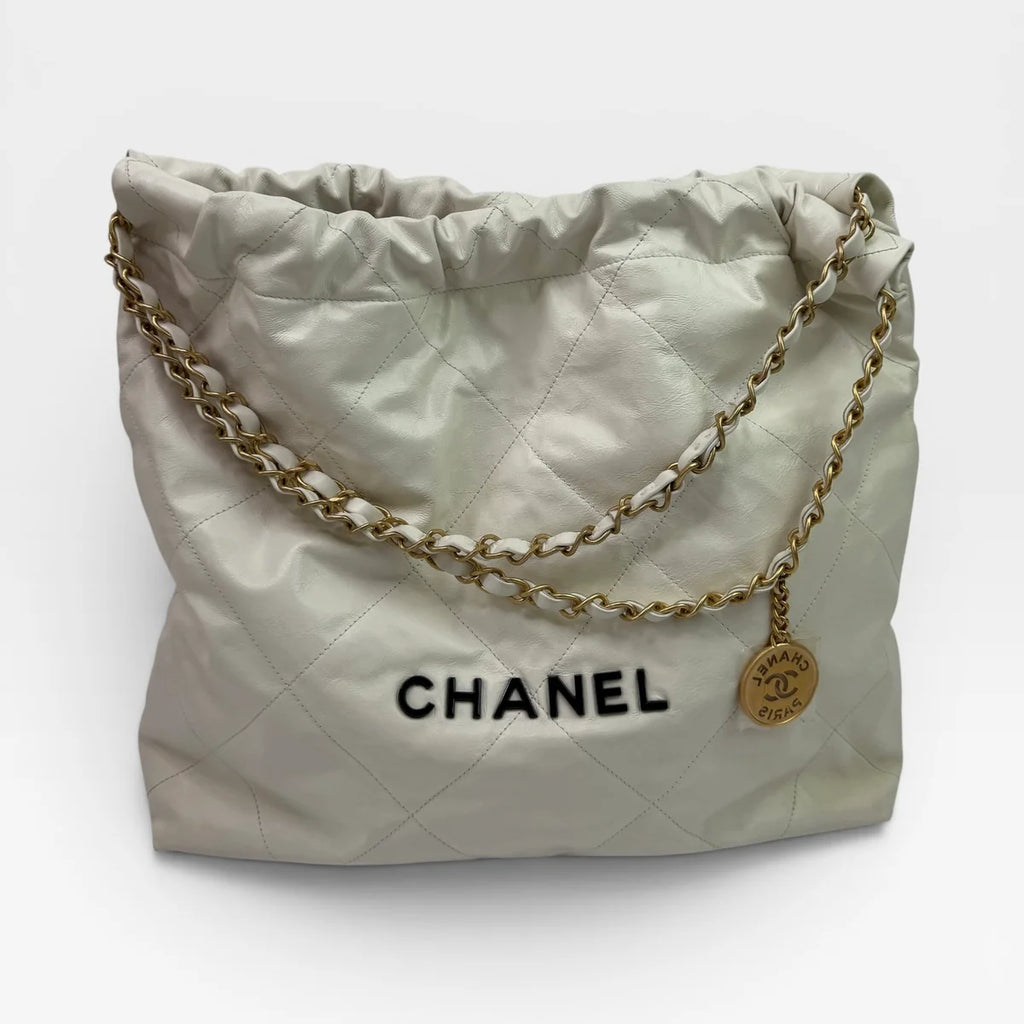 CHANEL 22 MEDIUM IN WHITE CALFSKIN LEATHER WITH GHW