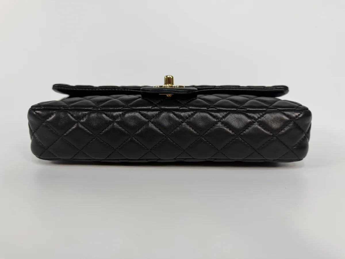 CHANEL EAST WEST CHARMS BAG IN BLACK LAMBSKIN LEATHER WITH GOLD HARDWARE